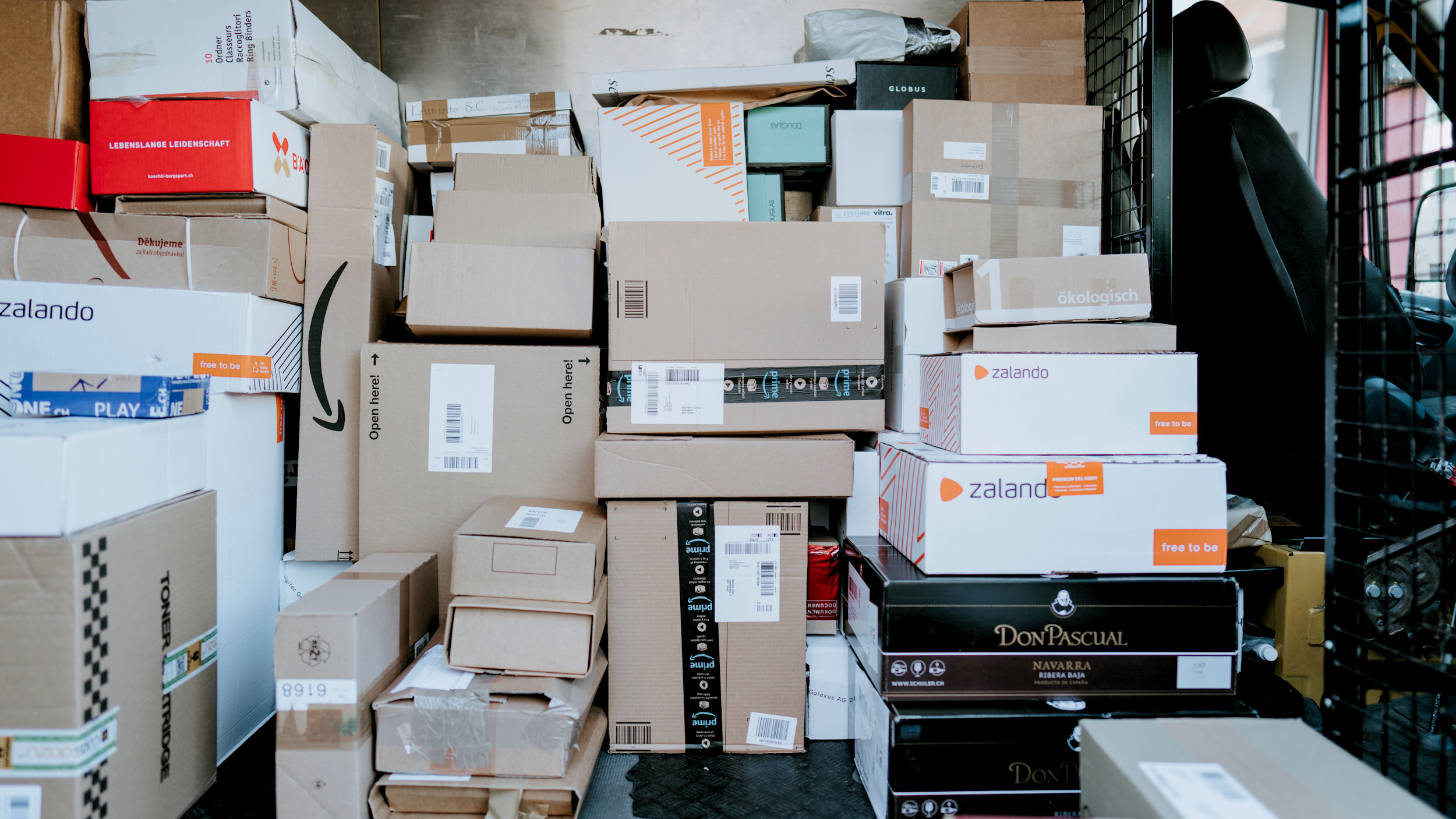Stack of ecommerce delivery parcels ready to ship
